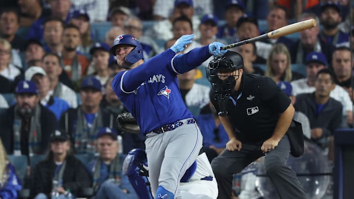 Oct 27, 2025; Los Angeles, California, USA; Toronto Blue Jays first baseman Ty France singles during the tenth inning against the Los Angeles Dodgers in game three of the 2025 MLB World Series at Dodger Stadium. Oct 27, 2025; Los Angeles, California, USA; Toronto Blue Jays first baseman Ty France singles during the tenth inning against the Los Angeles Dodgers in game three of the 2025 MLB World Series at Dodger Stadium.