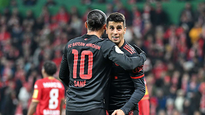 Leroy Sane y Joao Cancelo Leroy Sane y Joao Cancelo