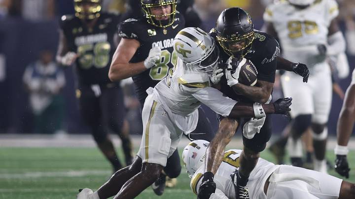 Sep 3, 2026; Atlanta, Georgia, USA; Colorado Buffaloes wide receiver DeAndre Moore Jr. (3) is tackled by Georgia Tech Yellow Jackets safety Savion Riley (13) at Bobby Dodd Stadium at Hyundai Field. Mandatory Credit: Brett Davis-Imagn Images Sep 3, 2026; Atlanta, Georgia, USA; Colorado Buffaloes wide receiver DeAndre Moore Jr. (3) is tackled by Georgia Tech Yellow Jackets safety Savion Riley (13) at Bobby Dodd Stadium at Hyundai Field. Mandatory Credit: Brett Davis-Imagn Images