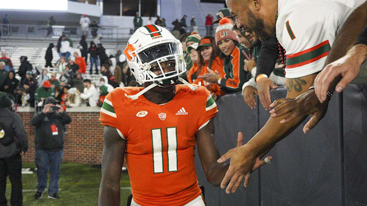 Nov 12, 2022; Atlanta, Georgia, USA; Miami Hurricanes quarterback Jacurri Brown (11) celebrates with