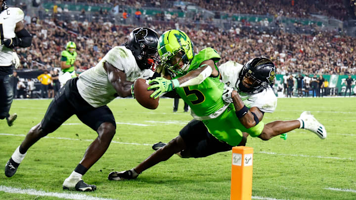 Nov 26, 2022; Tampa, Florida, USA; South Florida Bulls wide receiver Jimmy Horn Jr. (5) scores a two point conversion against the UCF Knights during the third quarter at Raymond James Stadium. Mandatory Credit: Douglas DeFelice-USA TODAY Sports