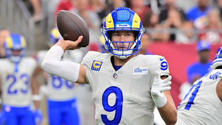 Sep 15, 2024; Glendale, Arizona, USA;  Los Angeles Rams quarterback Matthew Stafford (9) throws in the first half against the Arizona Cardinals at State Farm Stadium. Mandatory Credit: Matt Kartozian-Imagn Images