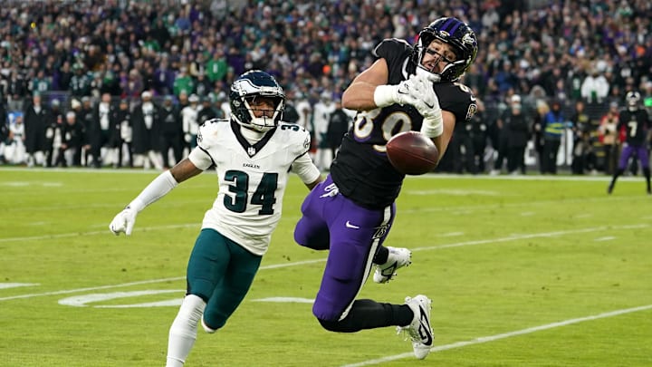 Dec 1, 2024; Baltimore, Maryland, USA; Baltimore Ravens tight end Mark Andrews (89) cannot make the first quarter catch defended by Philadelphia Eagles cornerback Isaiah Rodgers (34) at M&T Bank Stadium. Mandatory Credit: Mitch Stringer-Imagn Images