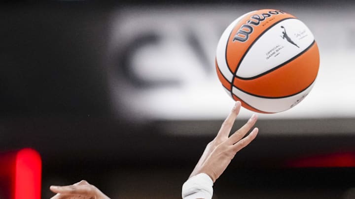 Jun 26, 2025; Indianapolis, Indiana, USA; The Indiana Fever and the Los Angeles Sparks go for the ball at tipoff  at Gainbridge Fieldhouse. Mandatory Credit: Grace Smith/INDIANAPOLIS STAR-Imagn Images