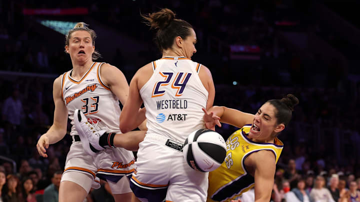 Jun 1, 2025; Los Angeles, California, USA; Los Angeles Sparks guard Kelsey Plum (10) collides with Phoenix Mercury forward Kathryn Westbeld (24) during the second half at Crypto.com Arena. Mandatory Credit: Kiyoshi Mio-Imagn Images Jun 1, 2025; Los Angeles, California, USA; Los Angeles Sparks guard Kelsey Plum (10) collides with Phoenix Mercury forward Kathryn Westbeld (24) during the second half at Crypto.com Arena. Mandatory Credit: Kiyoshi Mio-Imagn Images