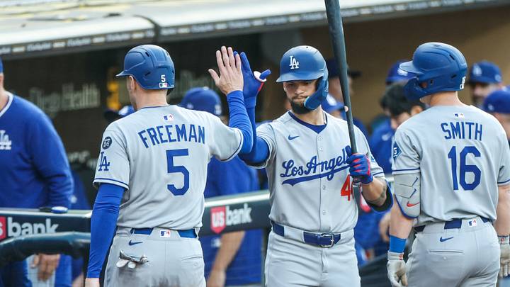 Jun 9, 2025; San Diego, California, USA; Los Angeles Dodgers first baseman Freddie Freeman (5) celebrates with Los Angeles Dodgers left fielder Andy Pages (44) after scoring a run during the first inning against the San Diego Padres at Petco Park. Mandatory Credit: David Frerker-Imagn Images Jun 9, 2025; San Diego, California, USA; Los Angeles Dodgers first baseman Freddie Freeman (5) celebrates with Los Angeles Dodgers left fielder Andy Pages (44) after scoring a run during the first inning against the San Diego Padres at Petco Park. Mandatory Credit: David Frerker-Imagn Images