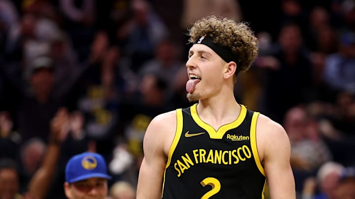Brandin Podziemski celebrates during the Golden State Warriors loss to the Minnesota Timberwolves on Tuesday night.