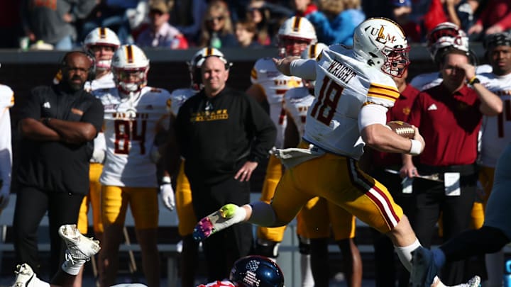 Nov 18, 2023; Oxford, Mississippi, USA; Louisiana Monroe Warhawks quarterback Jiya Wright (18) runs the ball during the second half against the Mississippi Rebels at Vaught-Hemingway Stadium. Mandatory Credit: Petre Thomas-USA TODAY Sports Nov 18, 2023; Oxford, Mississippi, USA; Louisiana Monroe Warhawks quarterback Jiya Wright (18) runs the ball during the second half against the Mississippi Rebels at Vaught-Hemingway Stadium. Mandatory Credit: Petre Thomas-USA TODAY Sports