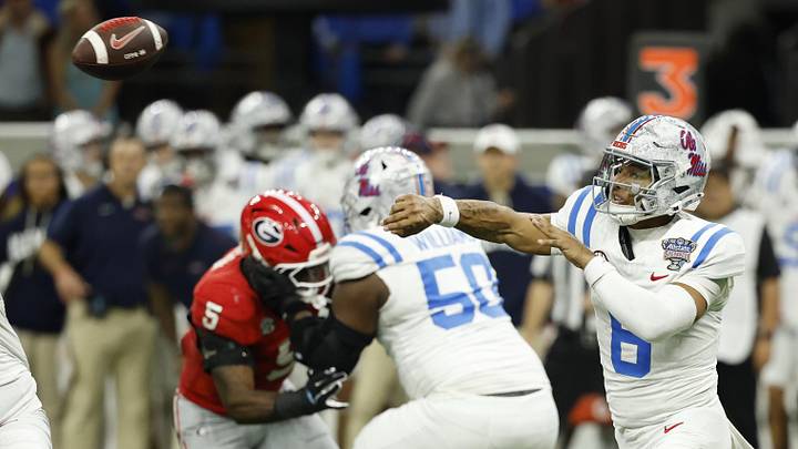 Jan 1, 2026; New Orleans, LA, USA; Mississippi Rebels quarterback Trinidad Chambliss (6) passes the ball Georgia Bulldogs in the fourth quarter during the 2026 Sugar Bowl and quarterfinal game of the College Football Playoff at Caesars Superdome. Mandatory Credit: Geoff Burke-Imagn Images