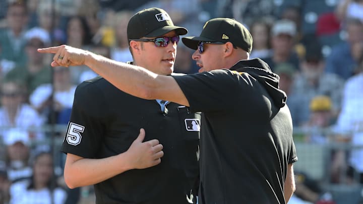 May 10, 2025; Pittsburgh, Pennsylvania, USA; Pittsburgh Pirates manager Don Kelly (right) argues with home plate umpire Clint Vondrak (15) against the Atlanta Braves during the sixth inning at PNC Park. Mandatory Credit: Charles LeClaire-Imagn Images May 10, 2025; Pittsburgh, Pennsylvania, USA; Pittsburgh Pirates manager Don Kelly (right) argues with home plate umpire Clint Vondrak (15) against the Atlanta Braves during the sixth inning at PNC Park. Mandatory Credit: Charles LeClaire-Imagn Images
