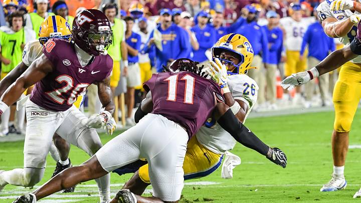 Oct 2, 2026; Blacksburg, Virginia, USA; Virginia Tech Hokies safety Dq Smith (11) tackles Pittsburgh Panthers running back Damon Ferguson Jr. (26) during the second quarter at Lane Stadium. Mandatory Credit: Brian Bishop-Imagn Images Oct 2, 2026; Blacksburg, Virginia, USA; Virginia Tech Hokies safety Dq Smith (11) tackles Pittsburgh Panthers running back Damon Ferguson Jr. (26) during the second quarter at Lane Stadium. Mandatory Credit: Brian Bishop-Imagn Images