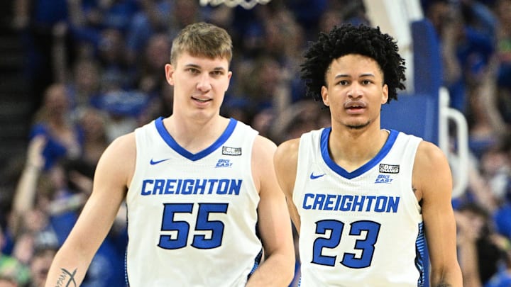 Feb 20, 2024; Omaha, Nebraska, USA;  Creighton Bluejays guard Trey Alexander (23) and guard Baylor