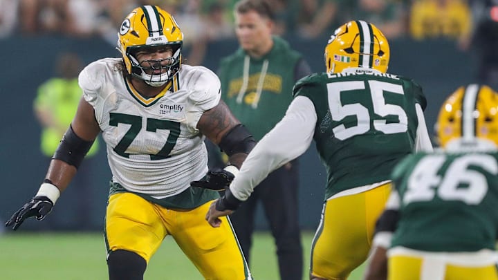 Green Bay Packers offensive lineman Jordan Morgan (77) blocks during Family Night on Saturday, August 2, 2025, at Lambeau Field in Green Bay, Wis. 
Tork Mason/USA TODAY NETWORK-Wisconsin