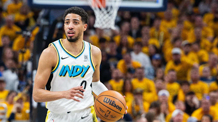 May 9, 2025; Indianapolis, Indiana, USA; Indiana Pacers guard Tyrese Haliburton (0) dribbles the ball during game three of the second round for the 2025 NBA Playoffs against the Cleveland Cavaliers at Gainbridge Fieldhouse. Mandatory Credit: Trevor Ruszkowski-Imagn Images