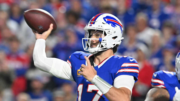 Sep 18, 2025; Orchard Park, New York, USA; Buffalo Bills quarterback Josh Allen (17) passes against the Miami Dolphins in the first quarter