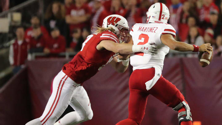 Wisconsin linebacker Andrew Van Ginkel (17) pressures Nebraska quarterback Adrian Martinez (2) during the second quarter of their game on October 6, 2018, at Camp Randall Stadium in Madison, Wis. Wisconsin beat Nebraska 41-24.