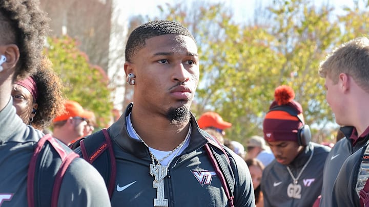 Nov 9, 2024; Blacksburg, Virginia, USA; Virginia Tech Hokies quarterback Kyron Drones (1) as he walks into the stadium before the game against the Clemson Tigers at Lane Stadium. Mandatory Credit: Brian Bishop-Imagn Images Nov 9, 2024; Blacksburg, Virginia, USA; Virginia Tech Hokies quarterback Kyron Drones (1) as he walks into the stadium before the game against the Clemson Tigers at Lane Stadium. Mandatory Credit: Brian Bishop-Imagn Images