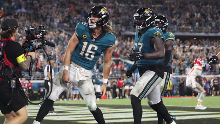 Oct 6, 2025; Jacksonville, Florida, USA; Jacksonville Jaguars quarterback Trevor Lawrence (16) celebrates with teammates after scoring a touchdown during the second half against the Kansas City Chiefs at EverBank Stadium. Mandatory Credit: Morgan Tencza-Imagn Images
