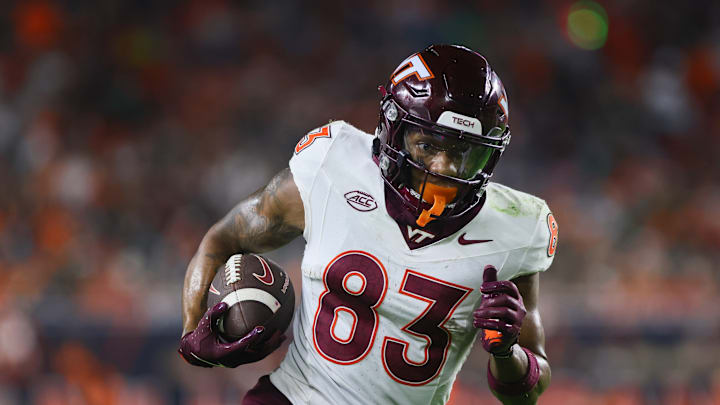 Sep 27, 2024; Miami Gardens, Florida, USA; Virginia Tech Hokies wide receiver Jaylin Lane (83) run with the football for a touchdown against the Miami Hurricanes during the second quarter at Hard Rock Stadium. 