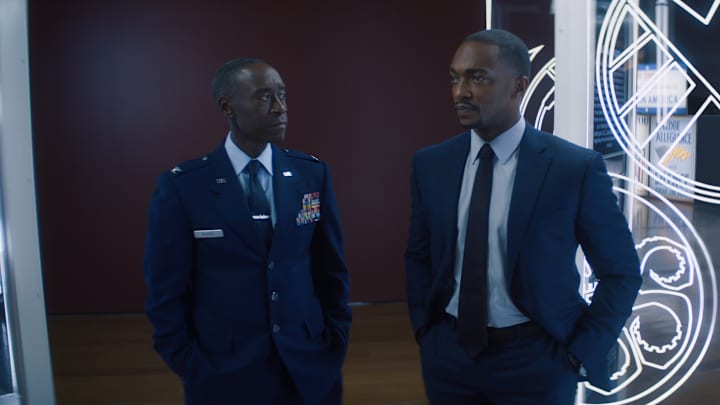 (L-R): Rhodey (Don Cheadle) and Falcon/Sam Wilson (Anthony Mackie) in Marvel Studios’ THE FALCON AND THE WINTER SOLDIER. Photo courtesy of Marvel Studios ©Marvel Studios 2021. All Rights Reserved. 