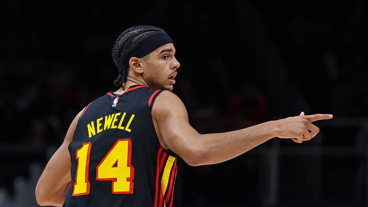 Dec 14, 2025; Atlanta, Georgia, USA; Atlanta Hawks forward Asa Newell (14) celebrates a three-point shot against the Philadelphia 76ers during the third quarter at State Farm Arena. Mandatory Credit: Jordan Godfree-Imagn Images Dec 14, 2025; Atlanta, Georgia, USA; Atlanta Hawks forward Asa Newell (14) celebrates a three-point shot against the Philadelphia 76ers during the third quarter at State Farm Arena. Mandatory Credit: Jordan Godfree-Imagn Images