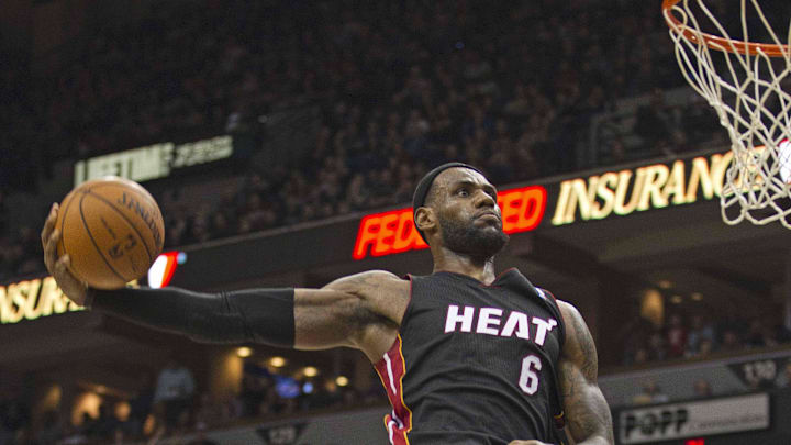 Dec 30, 2011; Minneapolis, MN, USA: Miami Heat forward LeBron James (6) goes up for a dunk in the second half against the Minnesota Timberwolves at Target Center. The Heat won 103-101. Mandatory Credit: Jesse Johnson-Imagn Images