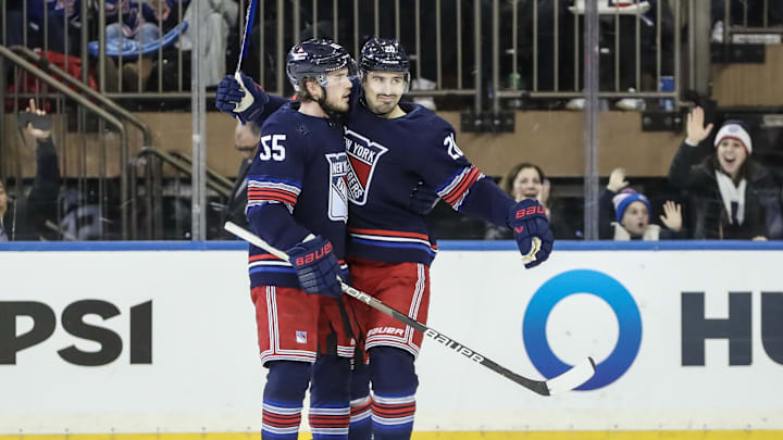 Dec 15, 2023; New York, New York, USA; New York Rangers left wing Chris Kreider (20) is greeted by