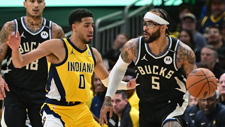 Apr 27, 2025; Milwaukee, Wisconsin, USA; Milwaukee Bucks guard Gary Trent Jr. (5) looks for a shot against Indiana Pacers guard Tyrese Haliburton (0) in the first quarter during game four of first round for the 2024 NBA Playoffs at Fiserv Forum. Mandatory Credit: Benny Sieu-Imagn Images