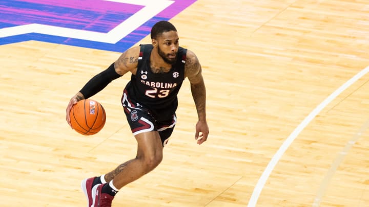 Mar 6, 2021; Lexington, Kentucky, USA; South Carolina Gamecocks guard Seventh Woods (23) dribbles the ball down the court during the first half of the game against the Kentucky Wildcats at Rupp Arena at Central Bank Center. Mandatory Credit: Arden Barnes-USA TODAY Sports Mar 6, 2021; Lexington, Kentucky, USA; South Carolina Gamecocks guard Seventh Woods (23) dribbles the ball down the court during the first half of the game against the Kentucky Wildcats at Rupp Arena at Central Bank Center. Mandatory Credit: Arden Barnes-USA TODAY Sports