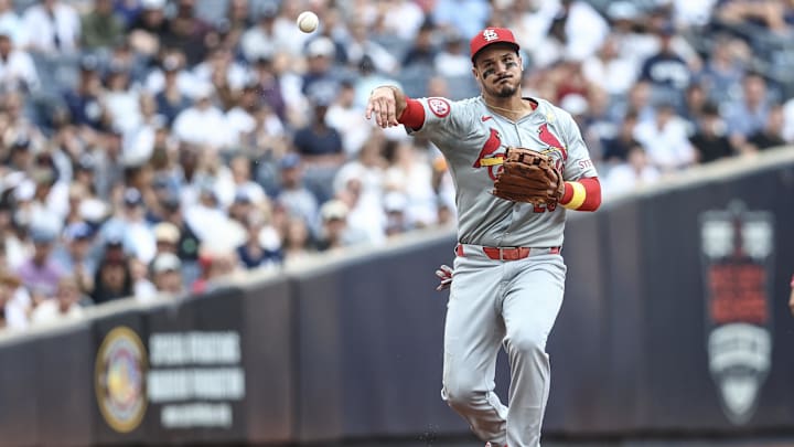 Bronx, New York, USA;  St. Louis Cardinals third baseman Nolan Arenado (28) throws a runner out at first base in the first inning against the New York Yankees at Yankee Stadium. Mandatory Credit: Wendell Cruz-Imagn Images