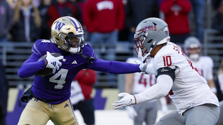 Nov 25, 2023; Seattle, Washington, USA; Washington Huskies wide receiver Germie Bernard (4) breaks a