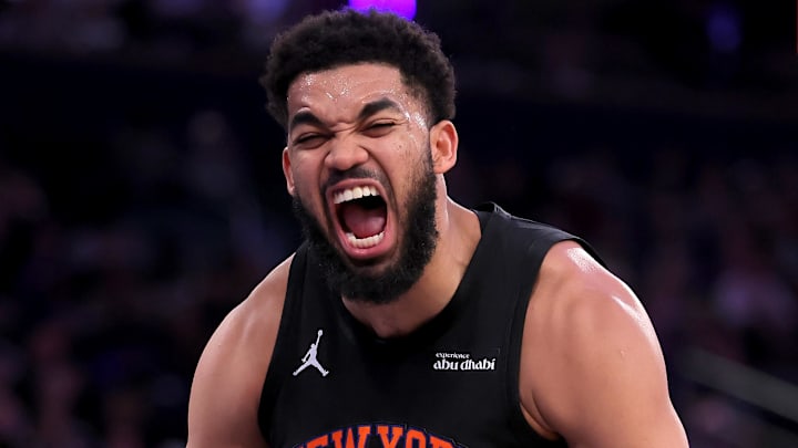 Dec 19, 2025; New York, New York, USA; New York Knicks center Karl-Anthony Towns (32) reacts during the second quarter against the Philadelphia 76ers at Madison Square Garden. Mandatory Credit: Brad Penner-Imagn Images