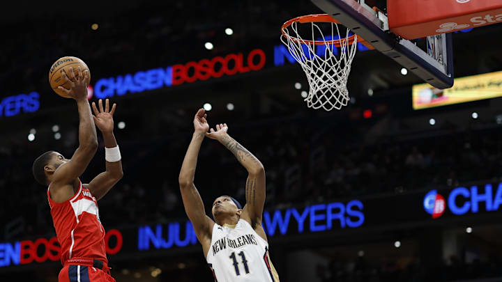 Jan 5, 2025; Washington, District of Columbia, USA; Washington Wizards guard Jared Butler (4) shoots the ball as New Orleans Pelicans guard Brandon Boston (11) defends in the second quarter at Capital One Arena. Mandatory Credit: Geoff Burke-Imagn Images Jan 5, 2025; Washington, District of Columbia, USA; Washington Wizards guard Jared Butler (4) shoots the ball as New Orleans Pelicans guard Brandon Boston (11) defends in the second quarter at Capital One Arena. Mandatory Credit: Geoff Burke-Imagn Images