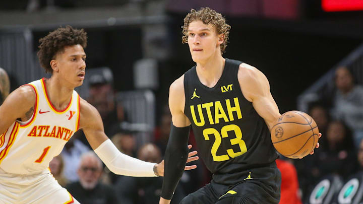 Feb 27, 2024; Atlanta, Georgia, USA; Utah Jazz forward Lauri Markkanen (23) handles the ball against the Atlanta Hawks in the first quarter at State Farm Arena. Mandatory Credit: Brett Davis-Imagn Images