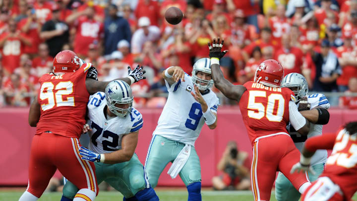 Sep 15, 2013; Kansas City, MO, USA; Dallas Cowboys quarterback Tony Romo (9) throws a pass as Kansas City Chiefs outside linebacker Justin Houston (50) during the first half at Arrowhead Stadium. Mandatory Credit: Denny Medley-Imagn Images Sep 15, 2013; Kansas City, MO, USA; Dallas Cowboys quarterback Tony Romo (9) throws a pass as Kansas City Chiefs outside linebacker Justin Houston (50) during the first half at Arrowhead Stadium. Mandatory Credit: Denny Medley-Imagn Images