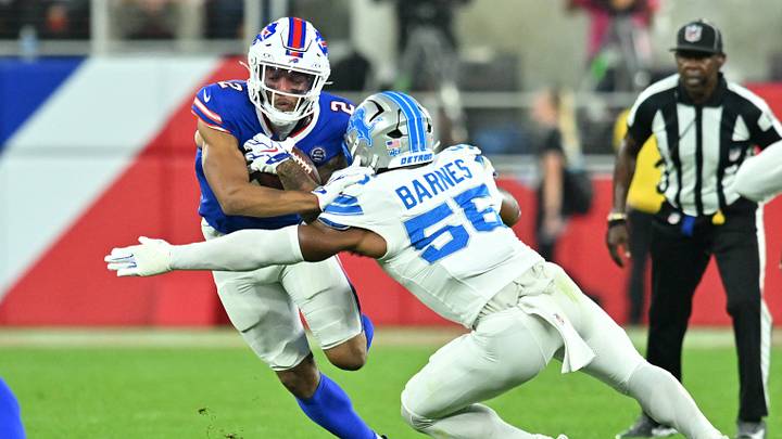 Buffalo Bills wide receiver DJ Moore (2) runs against Detroit Lions linebacker Derrick Barnes (55) during the first half at New Highmark Stadium. Mandatory Credit: Mark Konezny-Imagn Images Buffalo Bills wide receiver DJ Moore (2) runs against Detroit Lions linebacker Derrick Barnes (55) during the first half at New Highmark Stadium. Mandatory Credit: Mark Konezny-Imagn Images