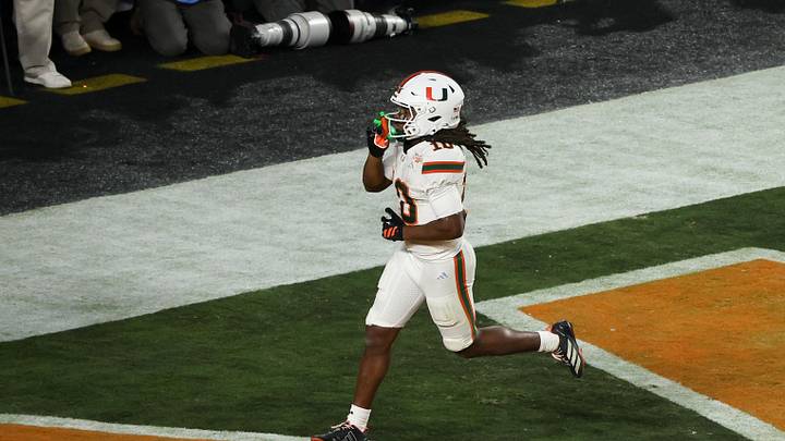 Jan 19, 2026; Miami Gardens, FL, USA; Miami Hurricanes wide receiver Malachi Toney (10) celebrates after scoring a touchdown against the Indiana Hoosiers in the fourth quarter during the College Football Playoff National Championship game at Hard Rock Stadium. Mandatory Credit: Kim Klement Neitzel-Imagn Images