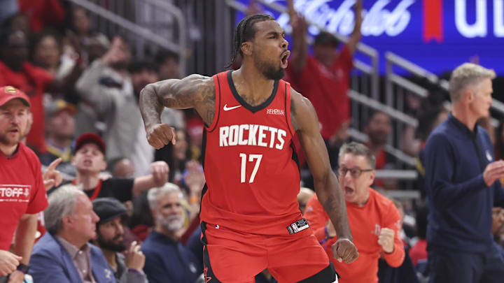 Apr 23, 2025; Houston, Texas, USA; Houston Rockets forward Tari Eason (17) reacts after making a basket during the second quarter during game two of the first round for the 2024 NBA Playoffs against the Golden State Warriors at Toyota Center. Mandatory Credit: Troy Taormina-Imagn Images