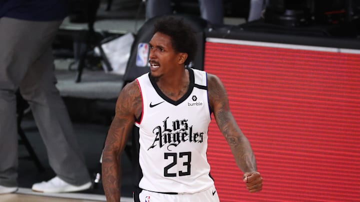 Sep 7, 2020; Lake Buena Vista, Florida, USA; LA Clippers guard Lou Williams (23) celebrates after making a three point basket against the Denver Nuggets during the second half of game three of the second round of the 2020 NBA Playoffs at AdventHealth Arena. Mandatory Credit: Kim Klement-Imagn Images