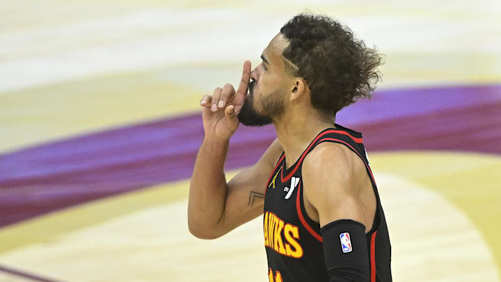 Atlanta Hawks guard Trae Young reacts after making a three-point basket in the fourth quarter against the Cleveland Cavaliers