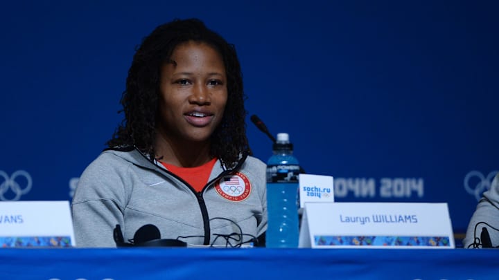 Feb 3, 2014; Sochi, RUSSIA; Lauryn Williams addresses the media during the USA Women's Bobsled Team press conference prior to the 2014 Sochi Winter Olympic Games at Main Media Center-Tolstoy Hall. Mandatory Credit: Kyle Terada-USA TODAY Sports