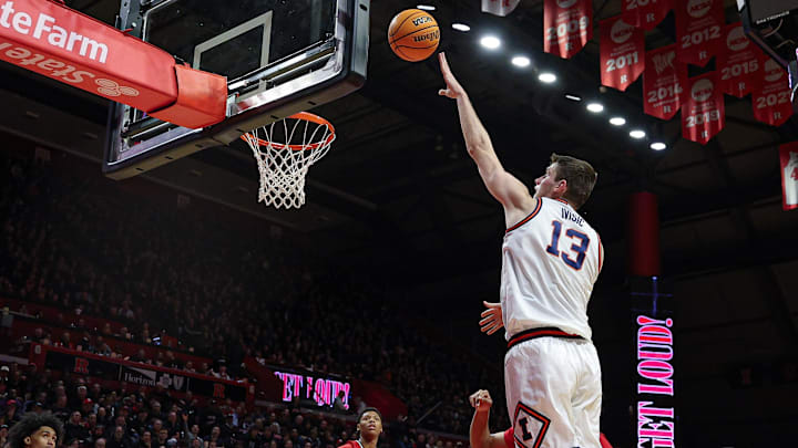 Feb 5, 2025; Piscataway, New Jersey, USA; Illinois Fighting Illini center Tomislav Ivisic (13) shoots the ball against the Rutgers Scarlet Knights during the first half at Jersey Mike's Arena. Mandatory Credit: Vincent Carchietta-Imagn Images Feb 5, 2025; Piscataway, New Jersey, USA; Illinois Fighting Illini center Tomislav Ivisic (13) shoots the ball against the Rutgers Scarlet Knights during the first half at Jersey Mike's Arena. Mandatory Credit: Vincent Carchietta-Imagn Images