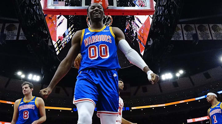 Jan 14, 2022; Chicago, Illinois, USA; Golden State Warriors forward Jonathan Kuminga (00) reacts after a defensive play against the Chicago Bulls during the second half at United Center. Mandatory Credit: David Banks-Imagn Images