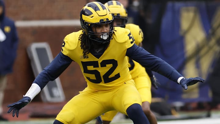 Apr 1, 2023; Ann Arbor, MI, USA;   Michigan Wolverines edge rusher Kechaun Bennett (52) rushes on defense during the Spring Game at Michigan Stadium. Mandatory Credit: Rick Osentoski-Imagn Images