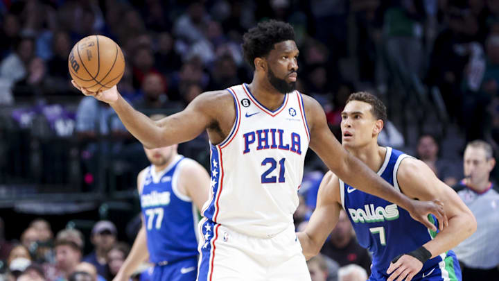 Mar 2, 2023; Dallas, Texas, USA; Philadelphia 76ers center Joel Embiid (21) looks to pass as Dallas Mavericks center Dwight Powell (7) defends during the first quarter at American Airlines Center. Mandatory Credit: Kevin Jairaj-Imagn Images Mar 2, 2023; Dallas, Texas, USA; Philadelphia 76ers center Joel Embiid (21) looks to pass as Dallas Mavericks center Dwight Powell (7) defends during the first quarter at American Airlines Center. Mandatory Credit: Kevin Jairaj-Imagn Images