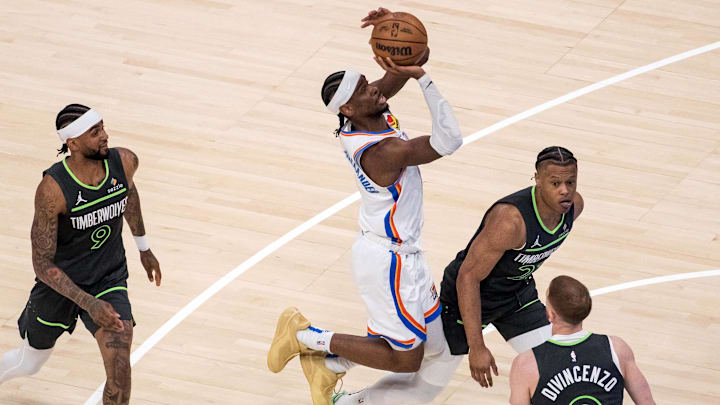 May 20, 2025; Oklahoma City, Oklahoma, USA; Oklahoma City Thunder guard Shai Gilgeous-Alexander (2) shoots against Minnesota Timberwolves guard Jaylen Clark (22) in the first quarter during game one of the western conference finals for the 2025 NBA Playoffs at Paycom Center. Mandatory Credit: Brett Rojo-Imagn Images May 20, 2025; Oklahoma City, Oklahoma, USA; Oklahoma City Thunder guard Shai Gilgeous-Alexander (2) shoots against Minnesota Timberwolves guard Jaylen Clark (22) in the first quarter during game one of the western conference finals for the 2025 NBA Playoffs at Paycom Center. Mandatory Credit: Brett Rojo-Imagn Images