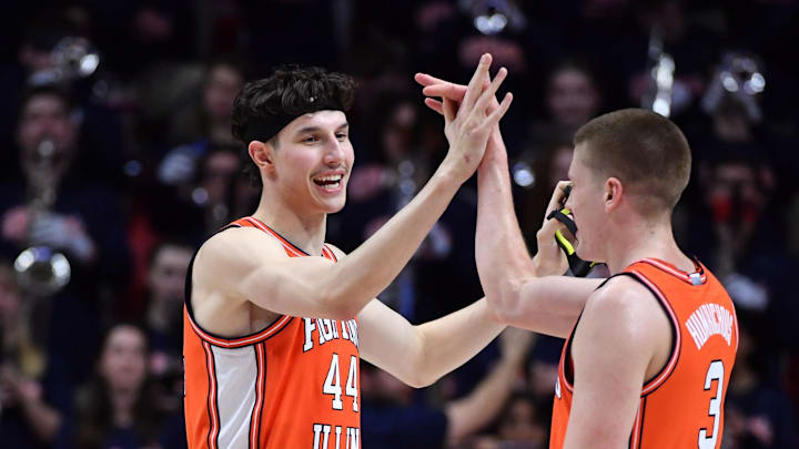 Jan 29, 2026; Champaign, Illinois, USA; Illinois Fighting Illini forward Zvonimir Ivisic (44) and teammate Ben Humrichhous (3) celebrate a win against the Washington Huskies at State Farm Center. Mandatory Credit: Ron Johnson-Imagn Images Jan 29, 2026; Champaign, Illinois, USA; Illinois Fighting Illini forward Zvonimir Ivisic (44) and teammate Ben Humrichhous (3) celebrate a win against the Washington Huskies at State Farm Center. Mandatory Credit: Ron Johnson-Imagn Images