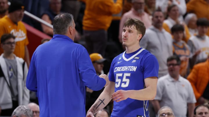 Mar 29, 2024; Detroit, MN, USA; Creighton Bluejays head coach Greg McDermott hugs guard Baylor Scheierman (55) after being defeated by Tennessee Volunteers during the NCAA Tournament Midwest Regional at Little Caesars Arena. Mandatory Credit: Rick Osentoski-USA TODAY Sports Mar 29, 2024; Detroit, MN, USA; Creighton Bluejays head coach Greg McDermott hugs guard Baylor Scheierman (55) after being defeated by Tennessee Volunteers during the NCAA Tournament Midwest Regional at Little Caesars Arena. Mandatory Credit: Rick Osentoski-USA TODAY Sports