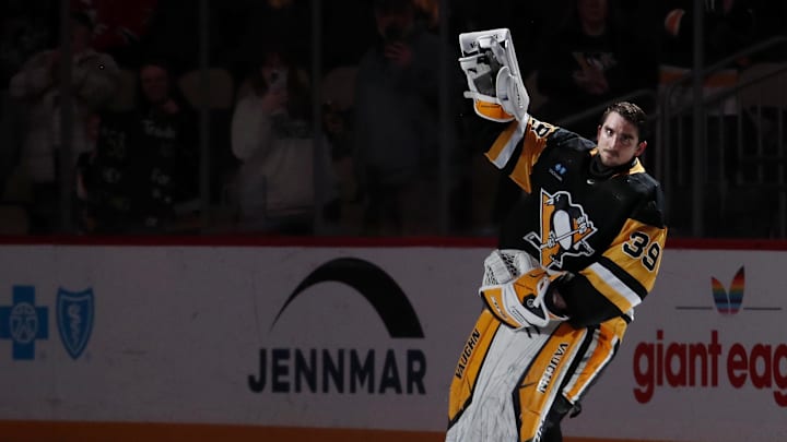 Mar 26, 2024; Pittsburgh, Pennsylvania, USA;  Pittsburgh Penguins goaltender Alex Nedeljkovic (39) reacts after being named first star of the game against the Carolina Hurricanes at PPG Paints Arena. Pittsburgh won 4-1. Mandatory Credit: Charles LeClaire-Imagn Images