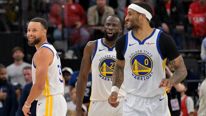 Apr 15, 2026; Inglewood, California, USA; Golden State Warriors guard Stephen Curry (30), forward Draymond Green (23) and guard Gary Payton II (0) smile in the second half during the play-in rounds of the 2026 NBA Playoffs at Intuit Dome. Mandatory Credit: Jayne Kamin-Oncea-Imagn Images